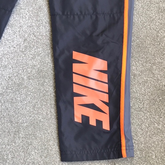 NIKE BOYS SIZE 4 CORE GFX LINED WIND PANT - Picture 6 of 6